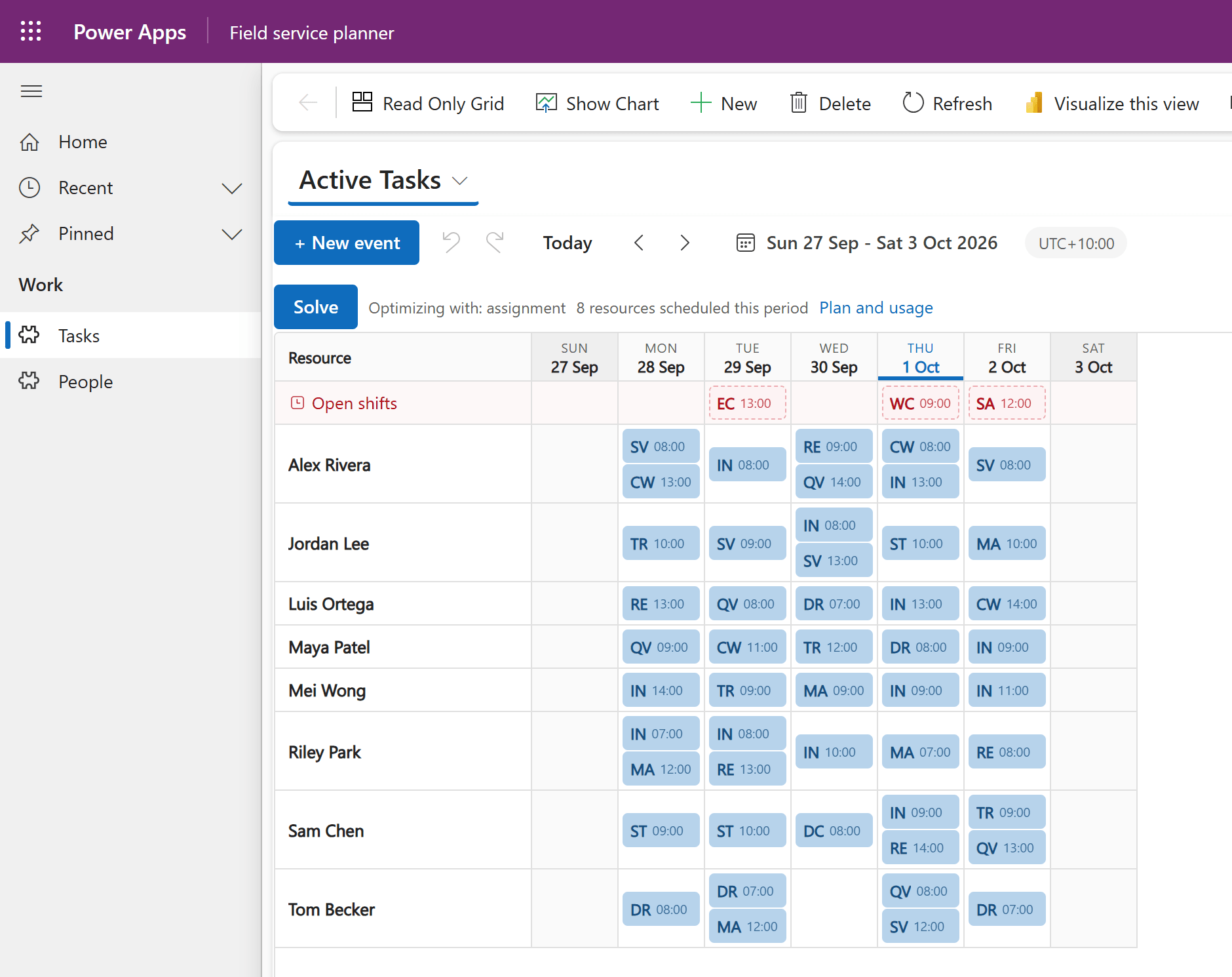 The Chrona Scheduler roster grid in Power Apps: one row per person, one column per day, jobs as chips with their start times, and open work in its own row
